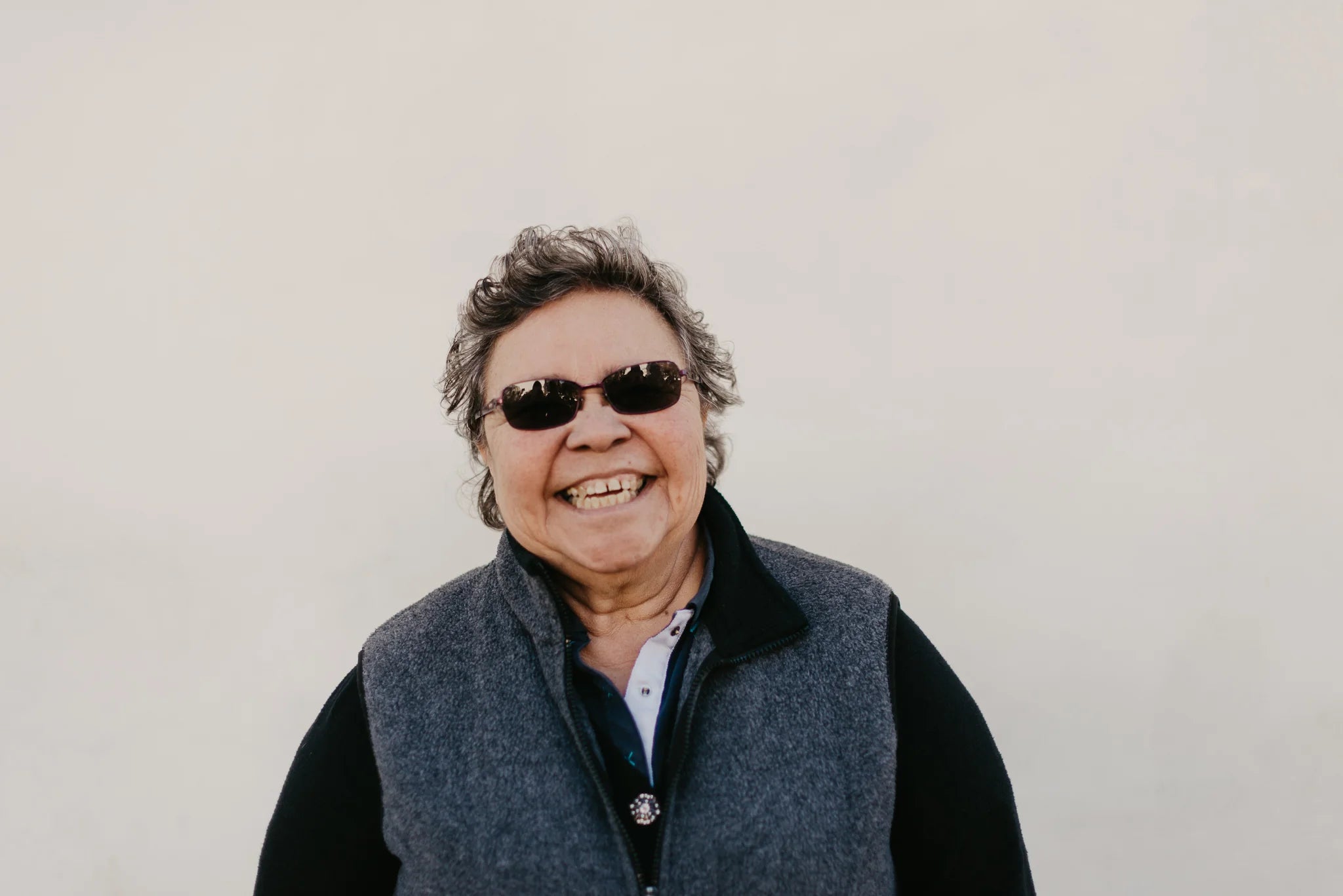 files/woman-laughing-in-sunglasses-like-a-boss.webp